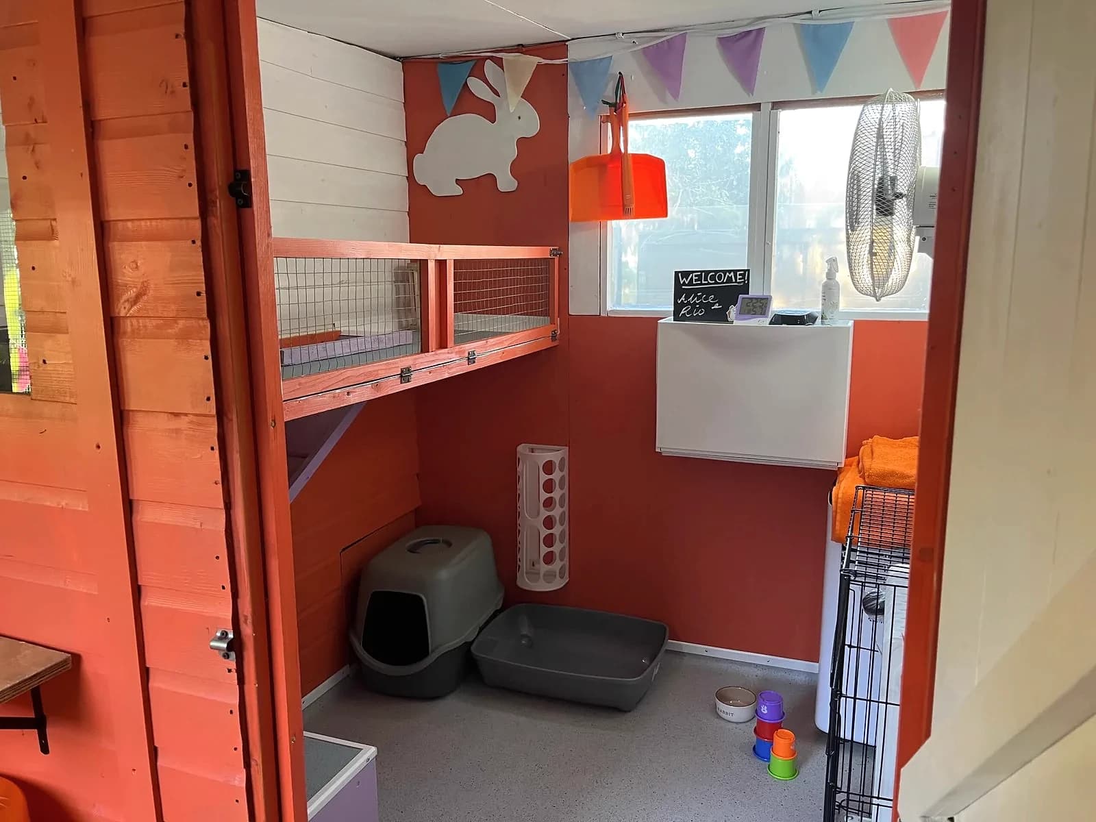 Orange Tree Lodge interior with hideaway, cooling unit and toys
